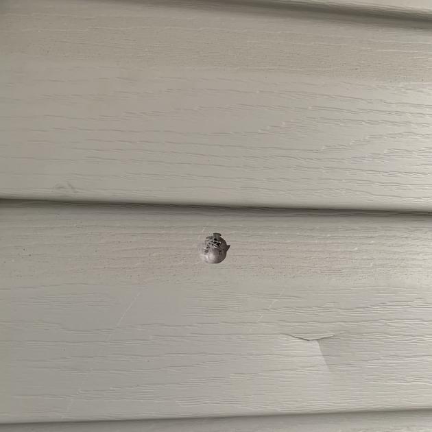 Bullet hole in house