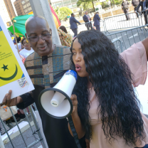 Woman speaking into a megaphone